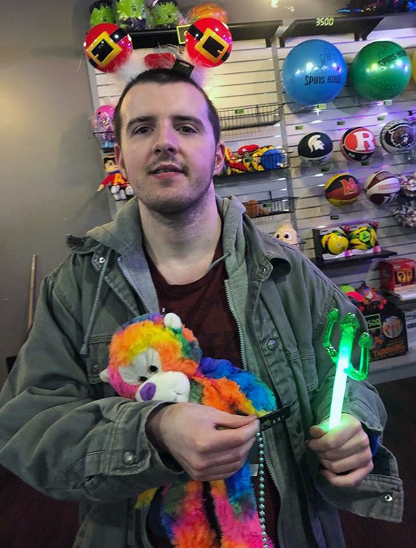 Above right: Frankie McCann and his prizes from the arcade.